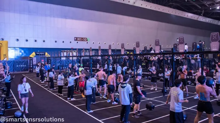 Busy gym fitness centre — indoor occupancy control prevents dangerous overcrowding by monitoring real-time capacity automatically