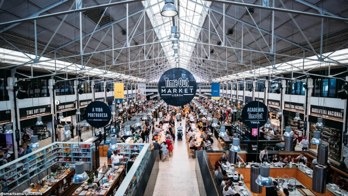 Busy retail store interior with shoppers — indoor people counting delivers accurate visitor data for smarter space management