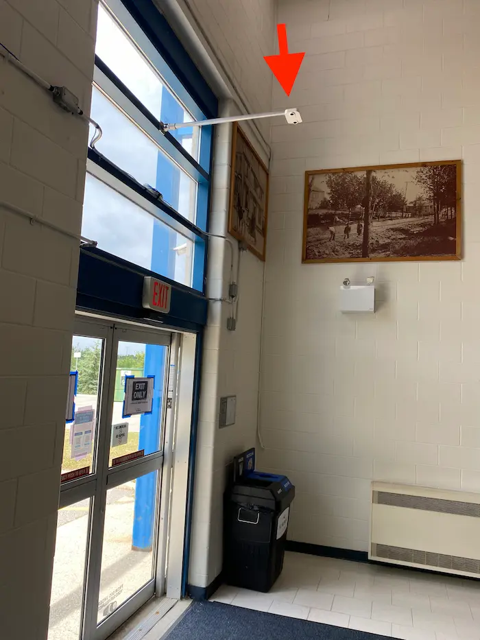 Indoor people counting sensor mounted above entrance — 3D stereoscopic technology for accurate visitor counting